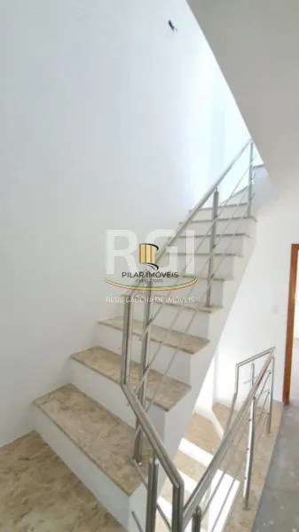 Casa 3 dormitórios no bairro Guarujá