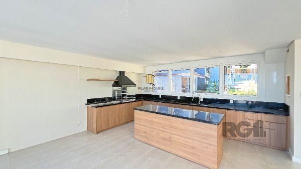 Casa Condominio em Porto Alegre, no bairro Hípica, com 3 dormitório(s), e 3 banheiros, à venda.