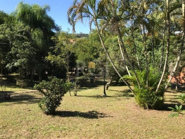 Sítio em Porto Alegre, no bairro Vila Nova, com 3 dormitório(s), à venda.