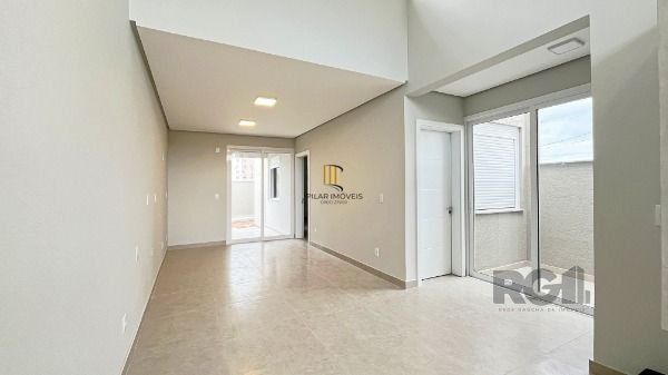Casa Condominio em Porto Alegre, no bairro Hípica, com 3 dormitório(s), e 3 banheiros, à venda.