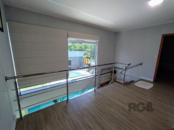 Casa em Porto Alegre, no bairro Hípica, com 3 dormitório(s), e 3 banheiros, à venda.