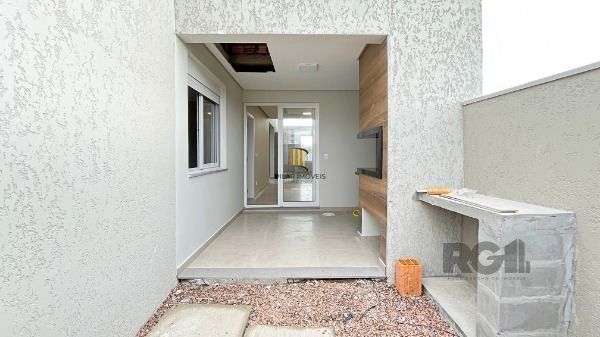Casa Condominio em Porto Alegre, no bairro Hípica, com 3 dormitório(s), e 3 banheiros, à venda.