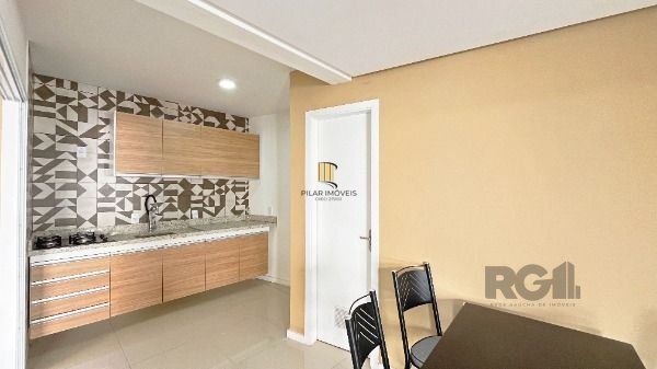 Casa Condominio em Porto Alegre, no bairro Ipanema, com 3 dormitório(s), e 3 banheiros, à venda.