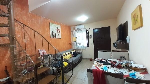 Casa Condominio em Porto Alegre, no bairro Vila Nova, com 3 dormitório(s), à venda.
