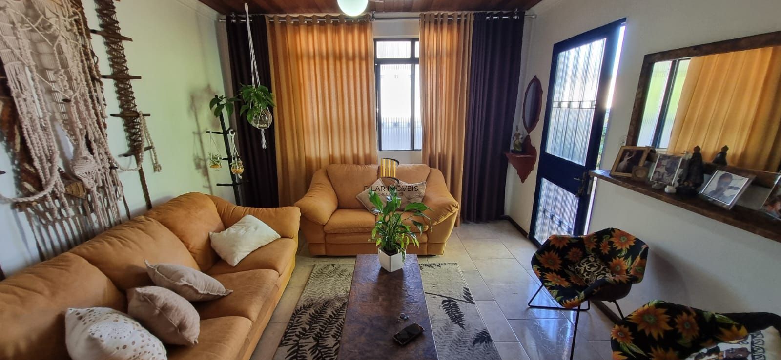 Casa com pavilhão