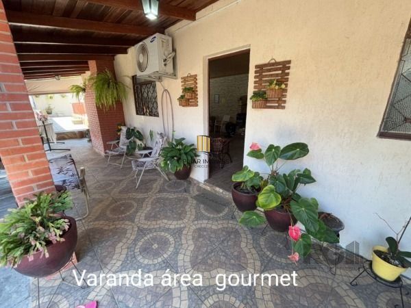 Casa 3 dormitórios no bairro Camaquã