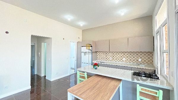 Casa Condominio em Porto Alegre, no bairro Hípica, com 3 dormitório(s), e 3 banheiros, à venda.