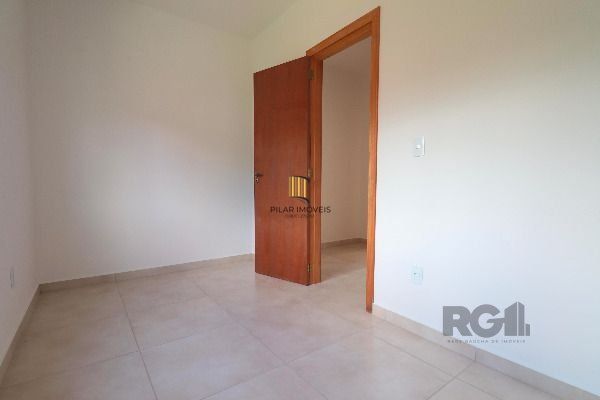 Casa Condominio em Porto Alegre, no bairro Vila Nova, com 2 dormitório(s), e 2 banheiros, à venda.