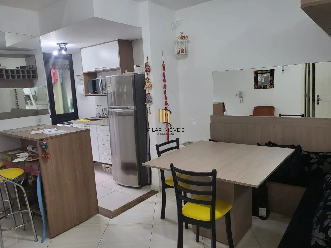 Apartamento com 1 quarto e 53m² à venda em Menino Deus, Porto Alegre.
