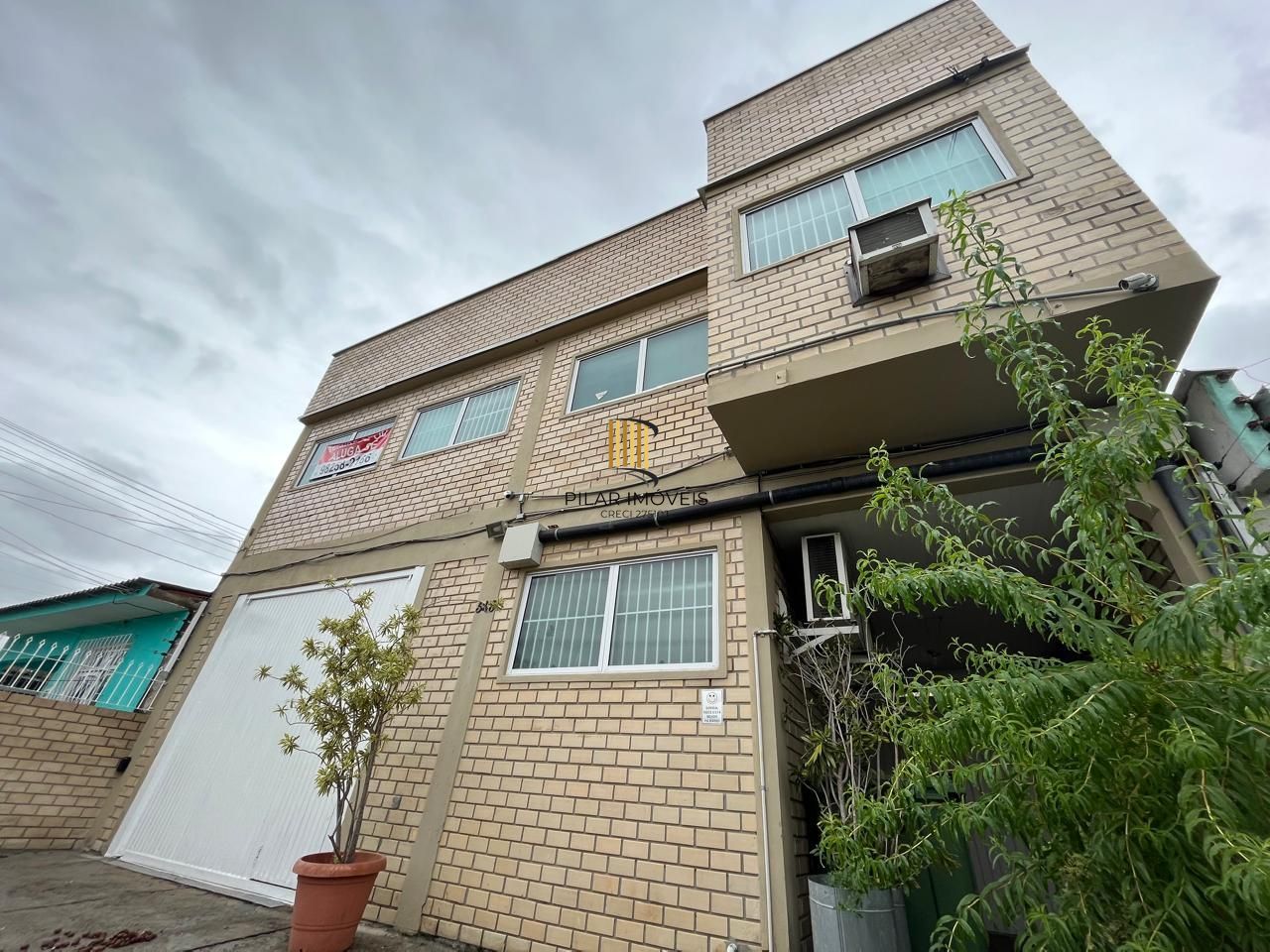 Prédio Comercial à venda com 5 salas, 400m², 6 vagas, Rua Laudelino Freire no bairro Sarandi em Porto Alegre