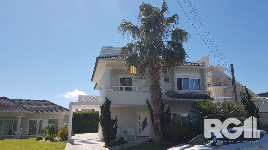 Casa de Condomínio 6 dormitórios no bairro Praia da Conceição - Pilar Imóveis