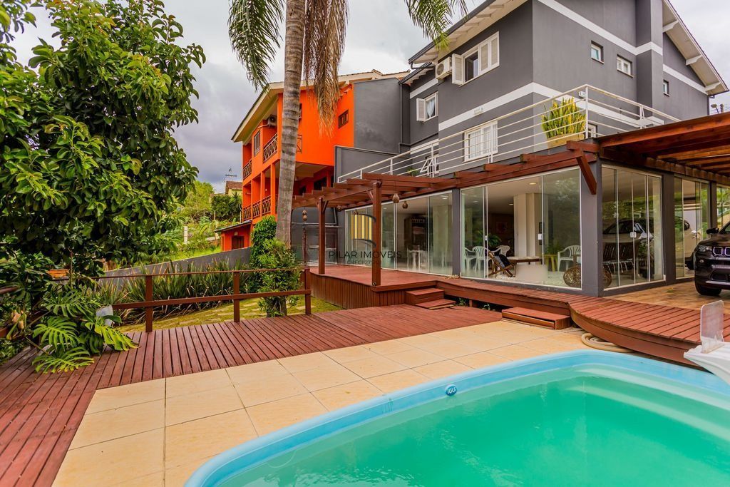 Casa em Condomínio com 3 dormitórios, suíte e 2 vagas cobertas. - Pilar Imóveis