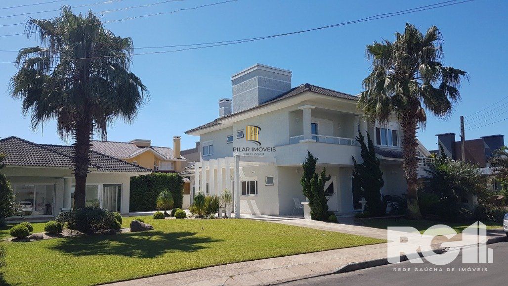 Casa de Condomínio 6 dormitórios no bairro Praia da Conceição