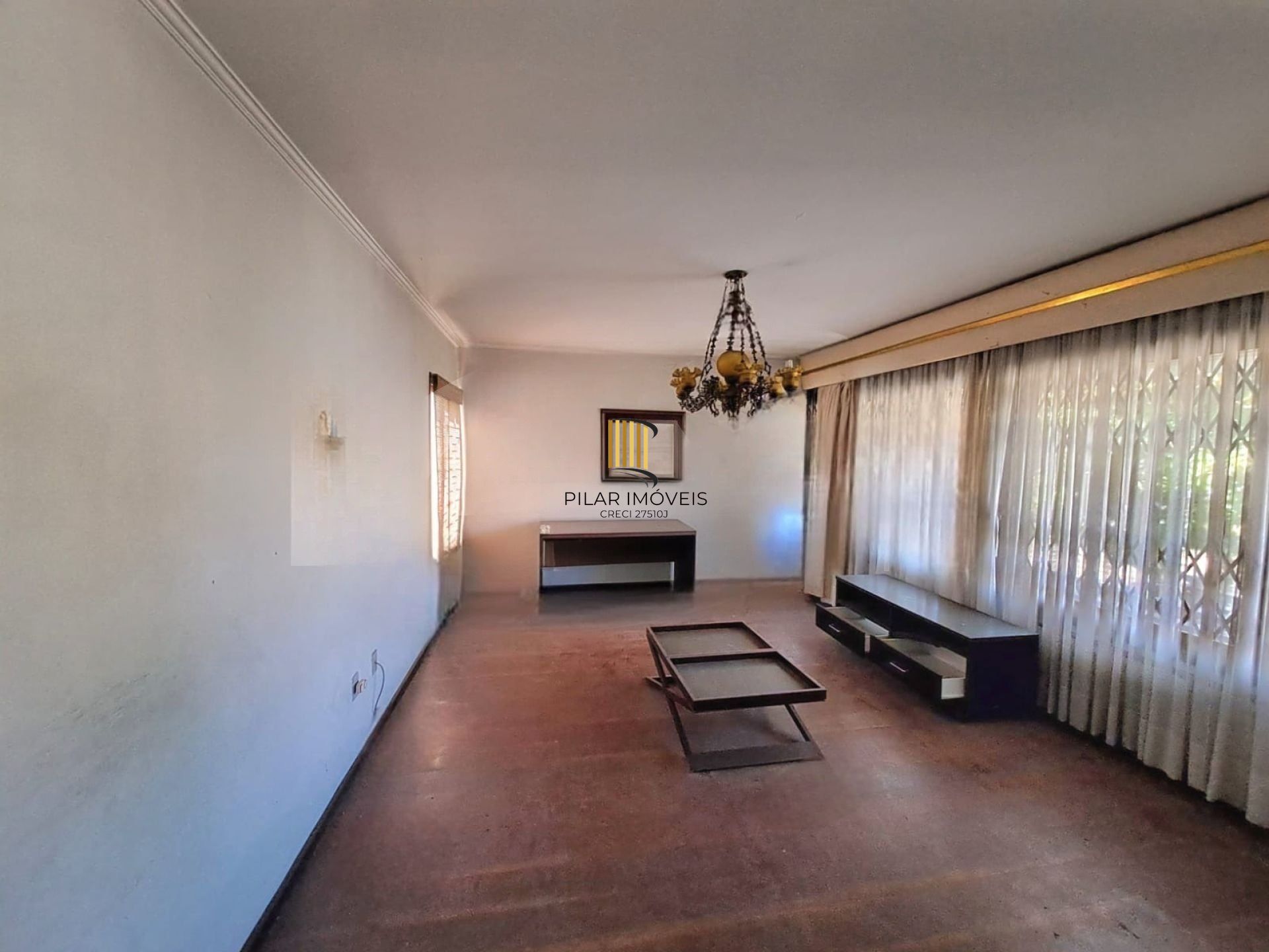 Casa com 3 dormitórios, pátio e área gourmet