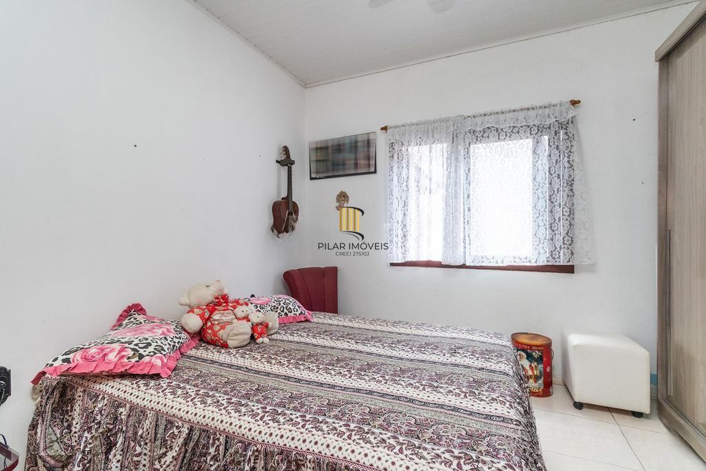 Casa com 3 dormitórios e suíte no Jardim Botânico, POA