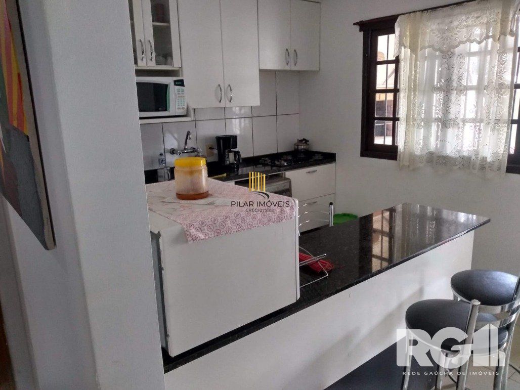 Excelente casa  3 dorm, 122m² privativos, amplo pátio com piscina nos fundos,  Rua Doutor João César Krieger