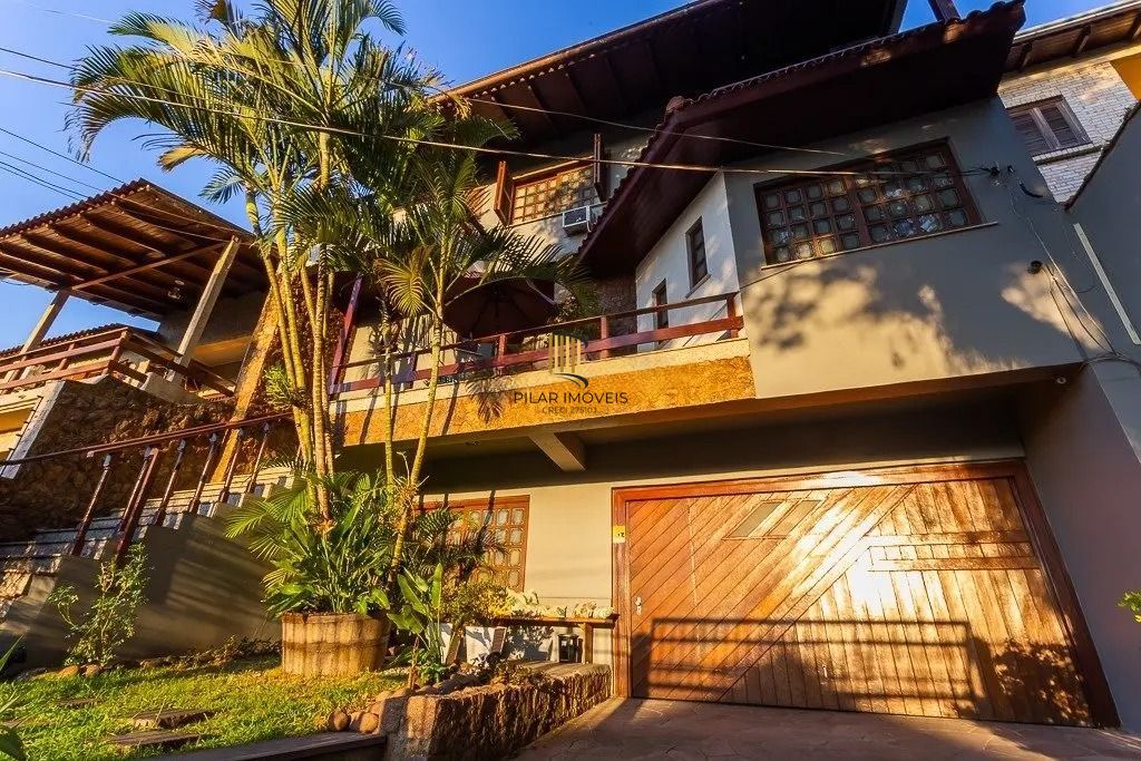 Casa espaçosa com 6 dormitórios e vista incrível no Cristo Redentor - Pilar Imóveis