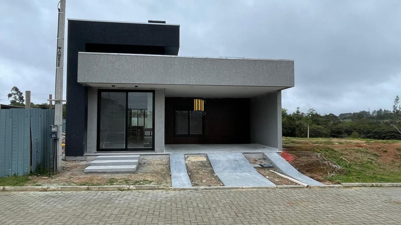 Casa em condomínio com 3 dormitórios, 2 suítes, churrasqueira, lareira e 2 vagas. - Pilar Imóveis