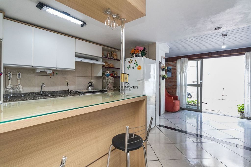 Casa com 3 dormitórios e suíte no Jardim Botânico, POA