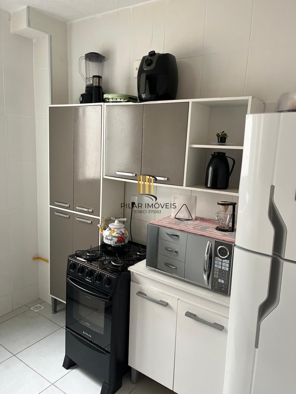 Apartamento com 2 dormitórios e vaga na Protásio Alves