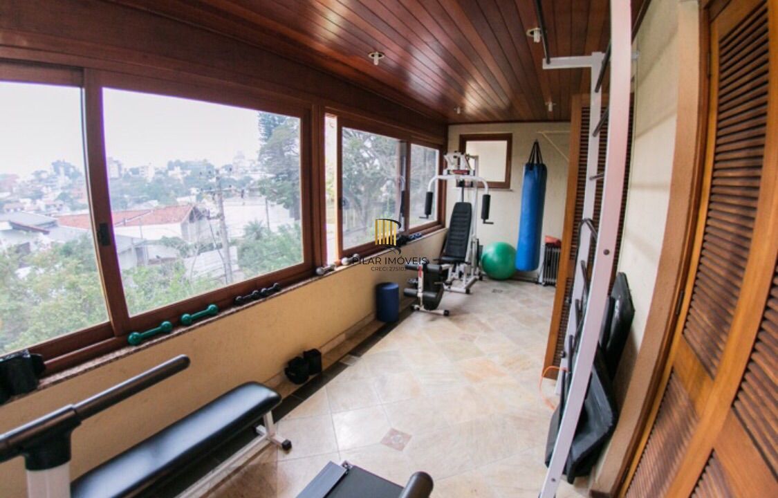 Casa de Condomínio 6 dormitórios no bairro Três Figueiras