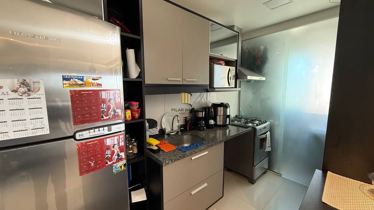 Apartamento mobiliado com sacada e churrasqueira