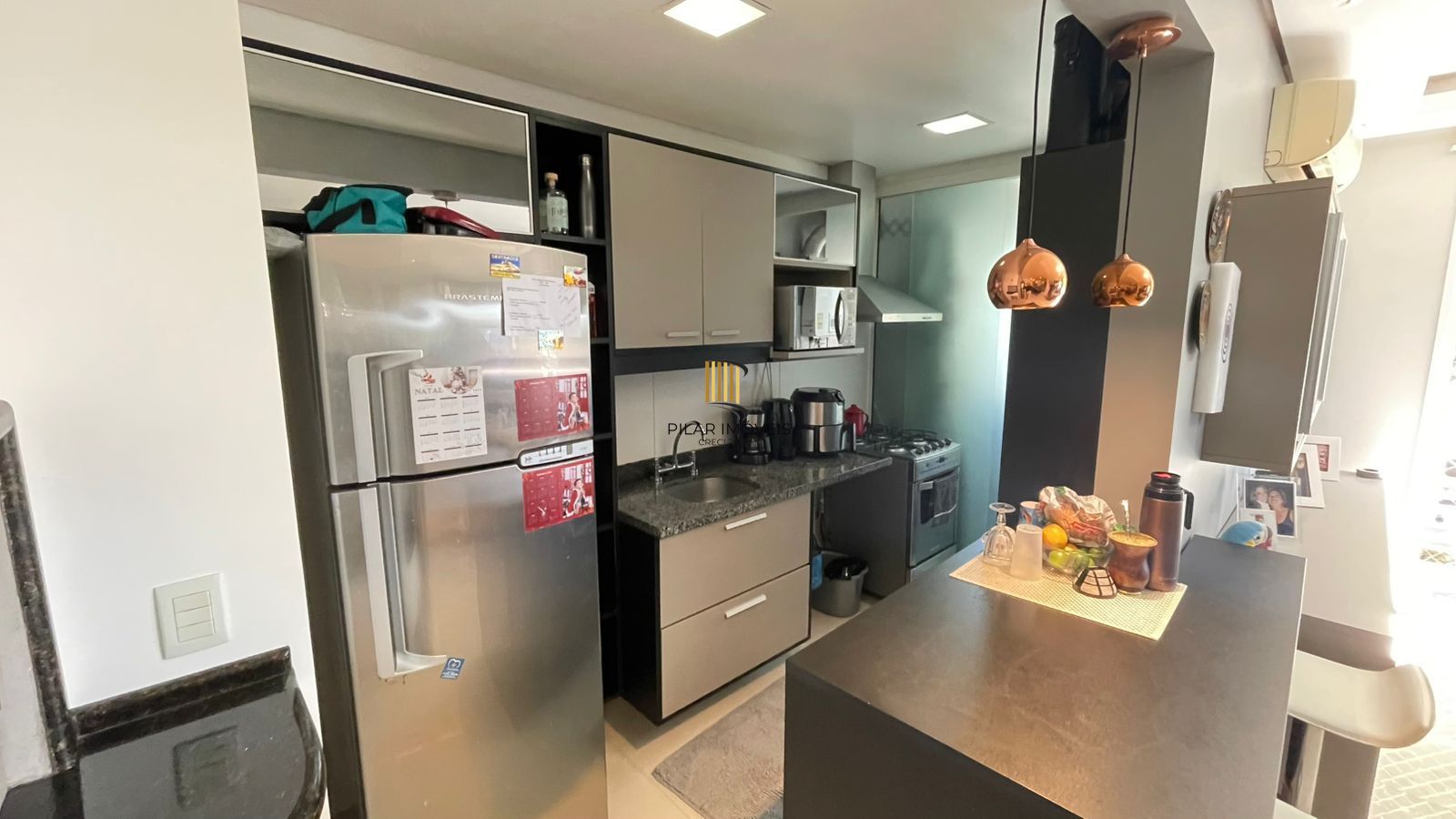 Apartamento mobiliado com sacada e churrasqueira