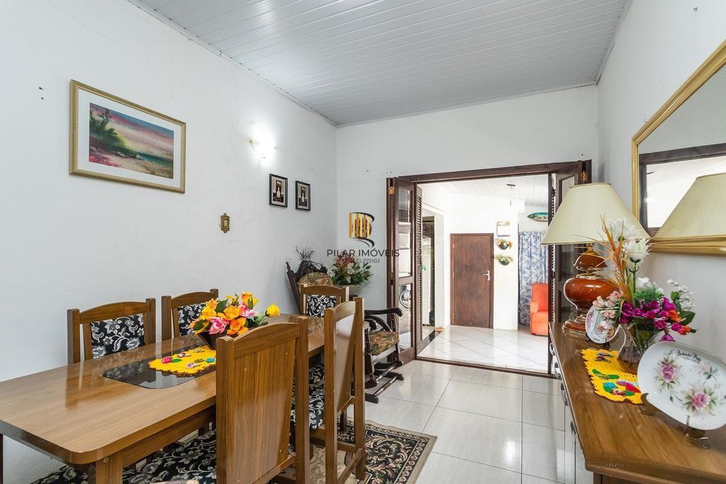 Casa com 3 dormitórios e suíte no Jardim Botânico, POA