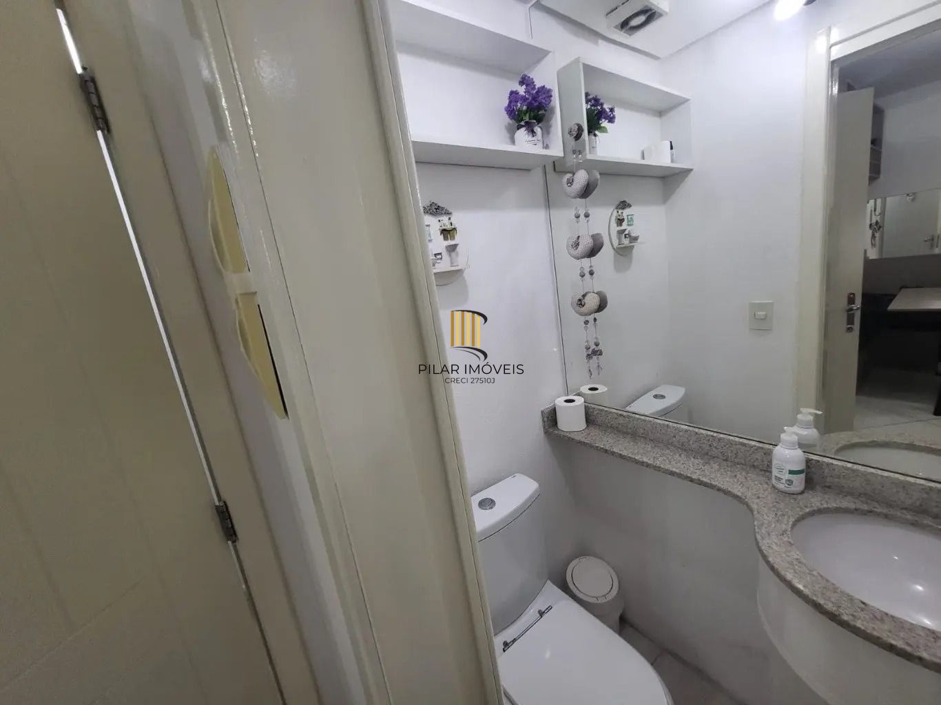 Apartamento com 1 quarto e 53m² à venda em Menino Deus, Porto Alegre.