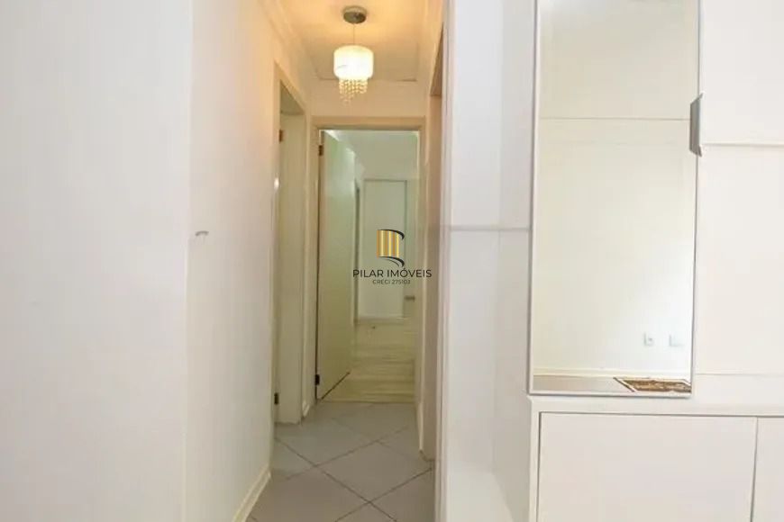 Apartamento com 2 dormitórios, suíte, churrasqueira e vaga de garagem.