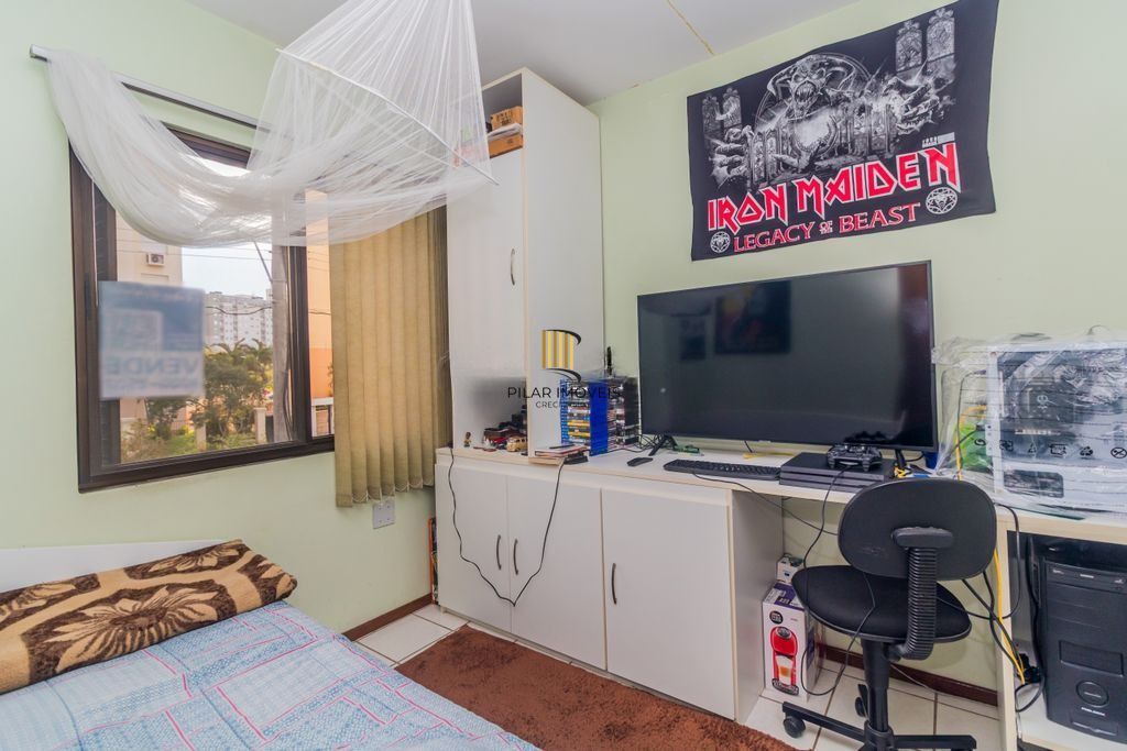 Apartamento iluminado com 2 dormitórios e vaga escriturada