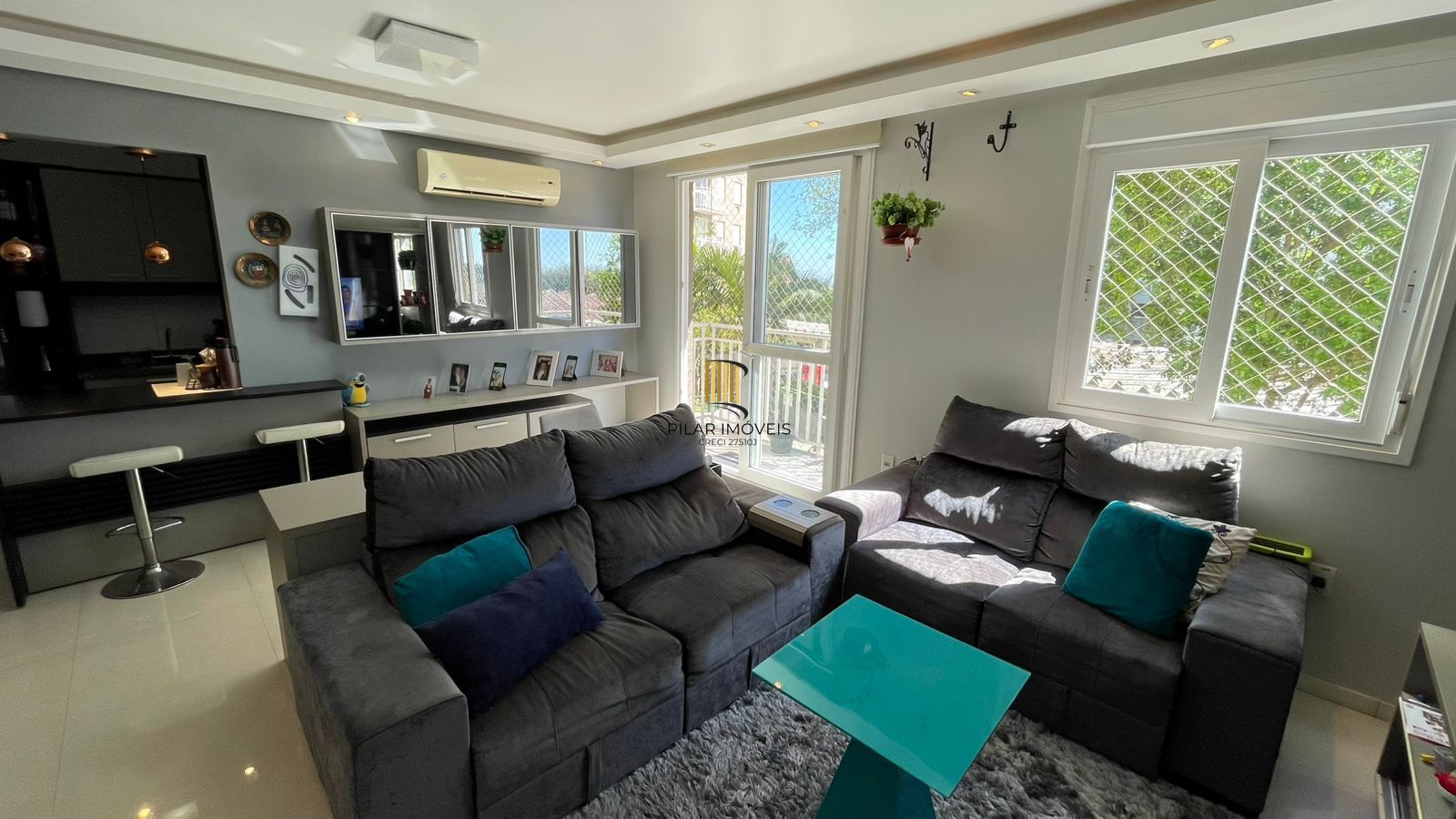 Apartamento mobiliado com sacada e churrasqueira