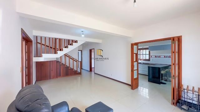 Casa térrea com 3 dormitórios, piscina, espaço gourmet com churrasqueira.