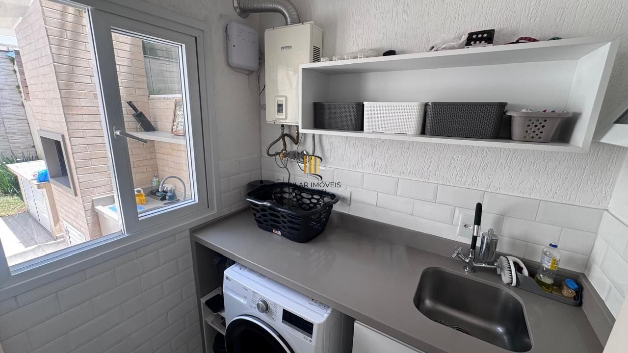 Casa mobiliada com living integrado e pátio gourmet