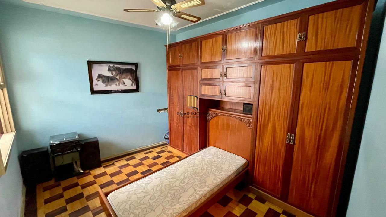 Terreno com casa e árvores frutíferas no Três Figueiras