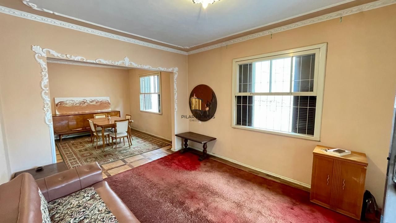 Terreno com casa e árvores frutíferas no Três Figueiras