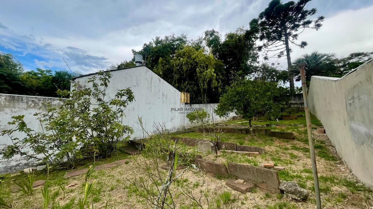 Terreno em área nobre com casa averbada e árvores frutíferas