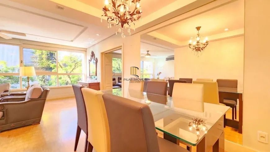 Apartamento 3 dormitórios, suíte, semimobiliado e duas vagas de garagem.