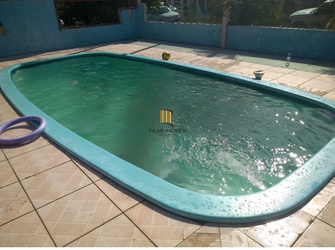 Casa com piscina com 3 dormitórios 2 banheiros em Tramandaí
