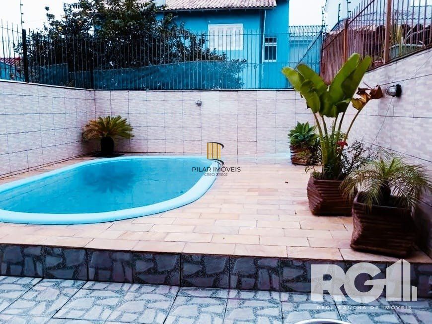 Excelente casa  3 dorm, 122m² privativos, amplo pátio com piscina nos fundos,  Rua Doutor João César Krieger