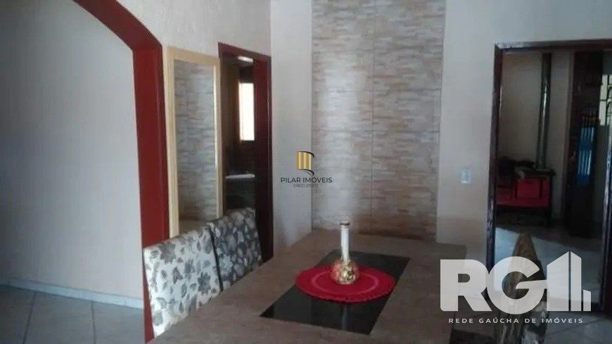 Casa 4 dormitórios no bairro Rubem Berta - Pilar Imóveis