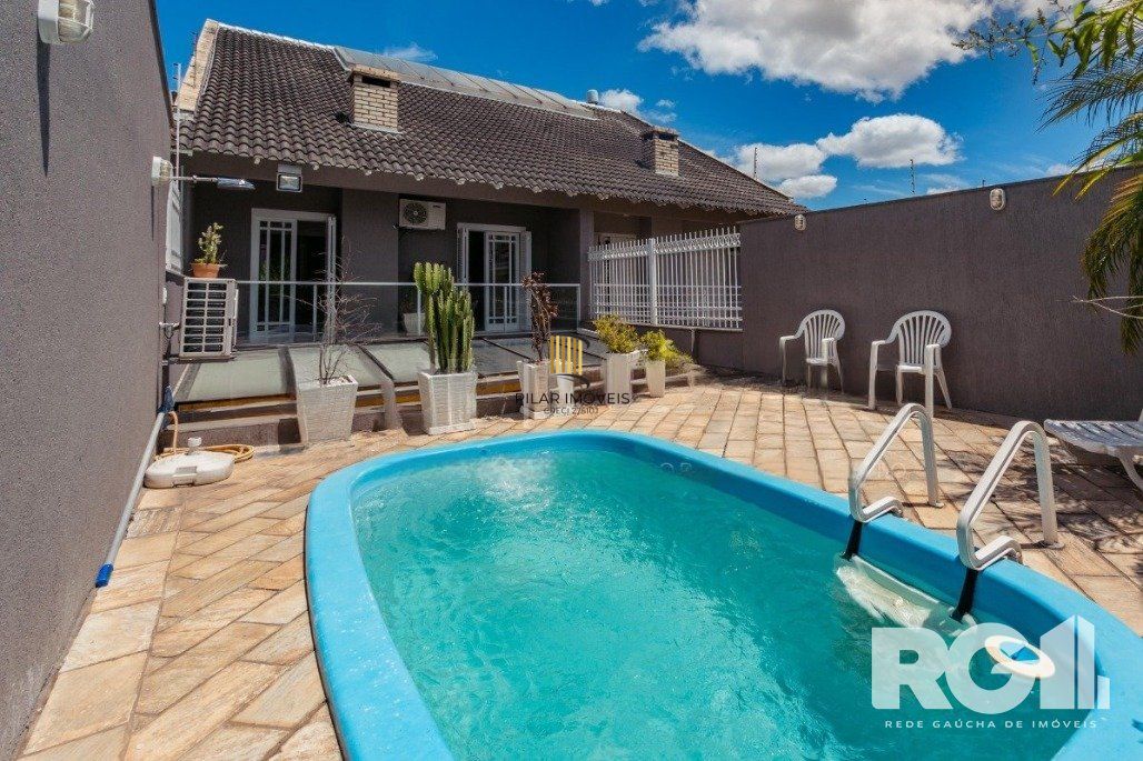 Casa 4 dormitórios no bairro Jardim Planalto - Pilar Imóveis