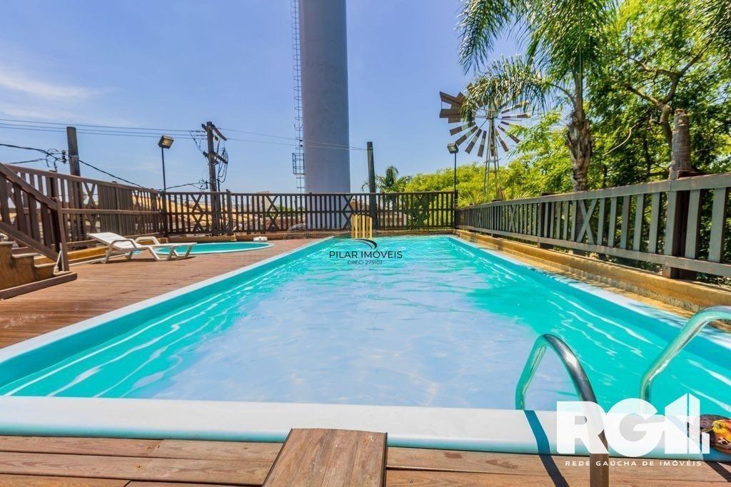 Casa em condomínio com 3 dormitórios, suíte, espaço gourmet.