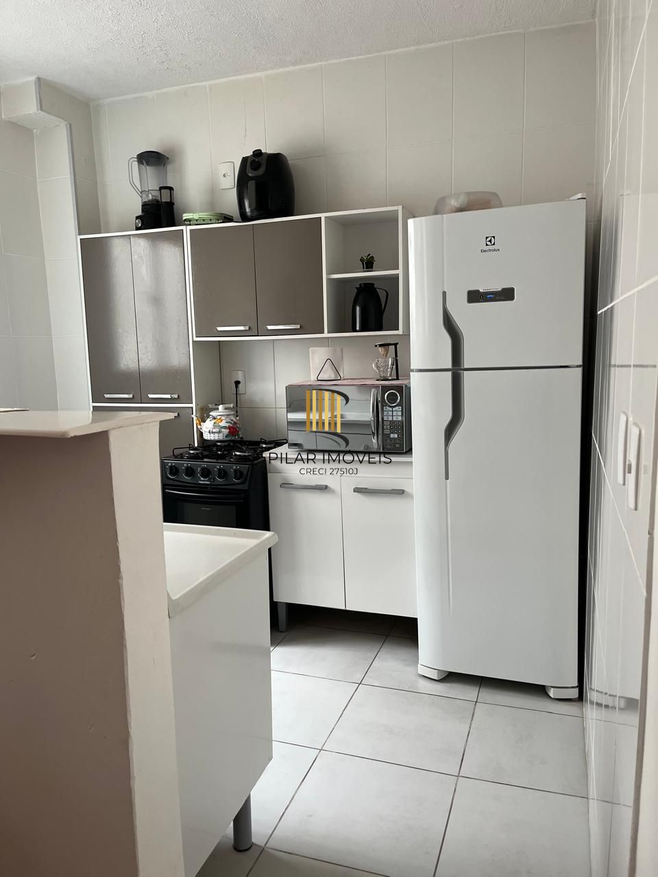 Apartamento com 2 dormitórios e vaga na Protásio Alves