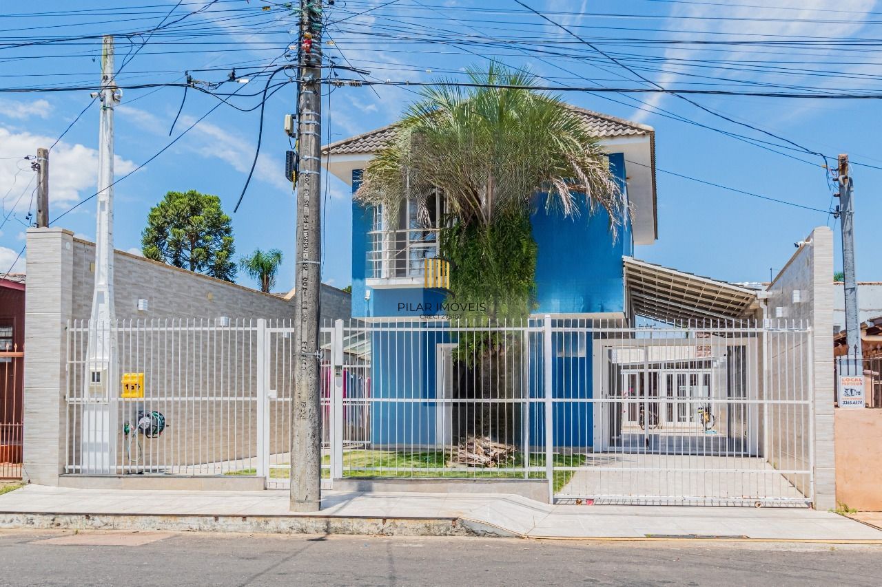 Casa 3 dormitórios no bairro Vila Carlos Antônio Wilkens