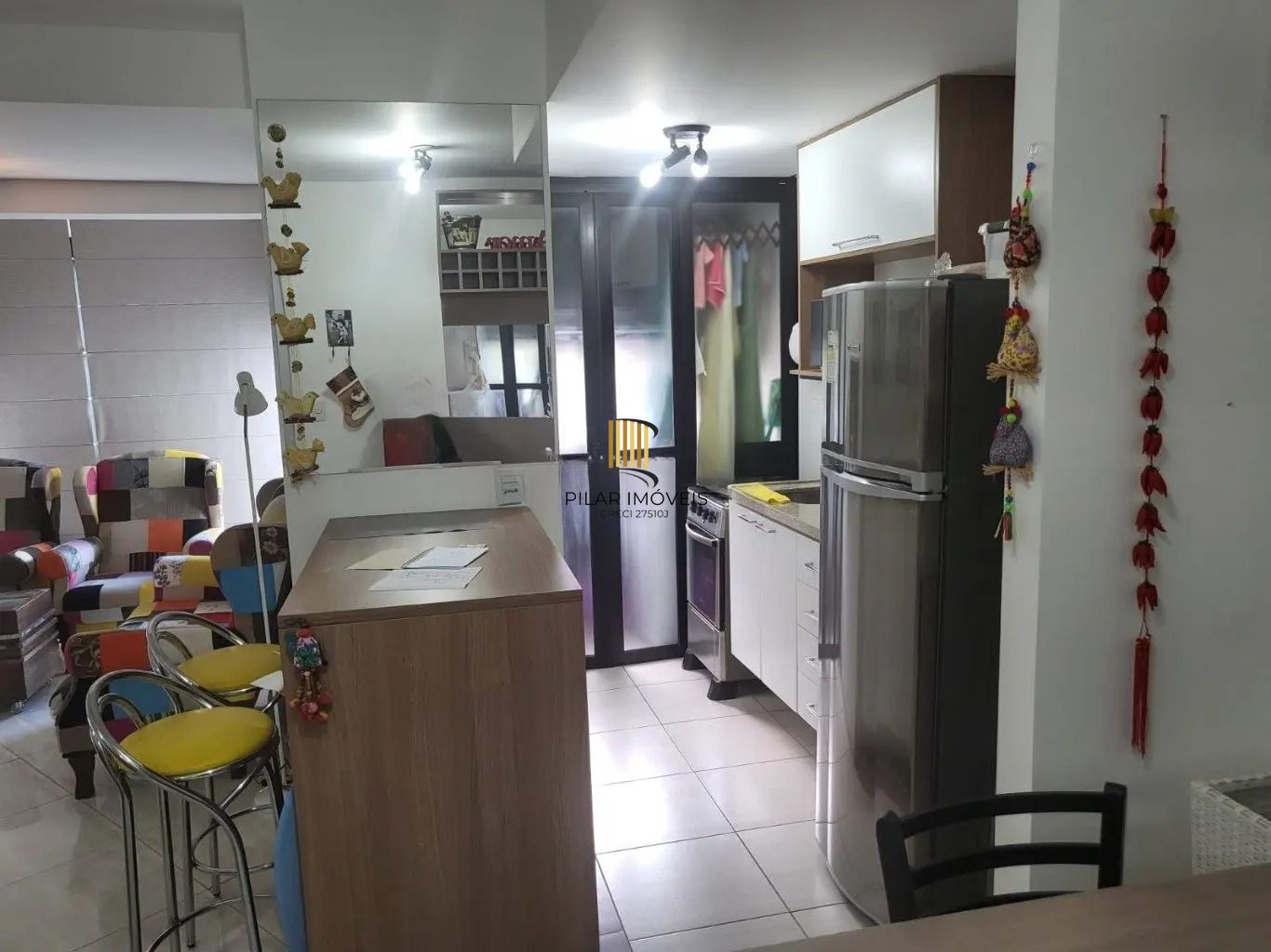 Apartamento com 1 quarto e 53m² à venda em Menino Deus, Porto Alegre.