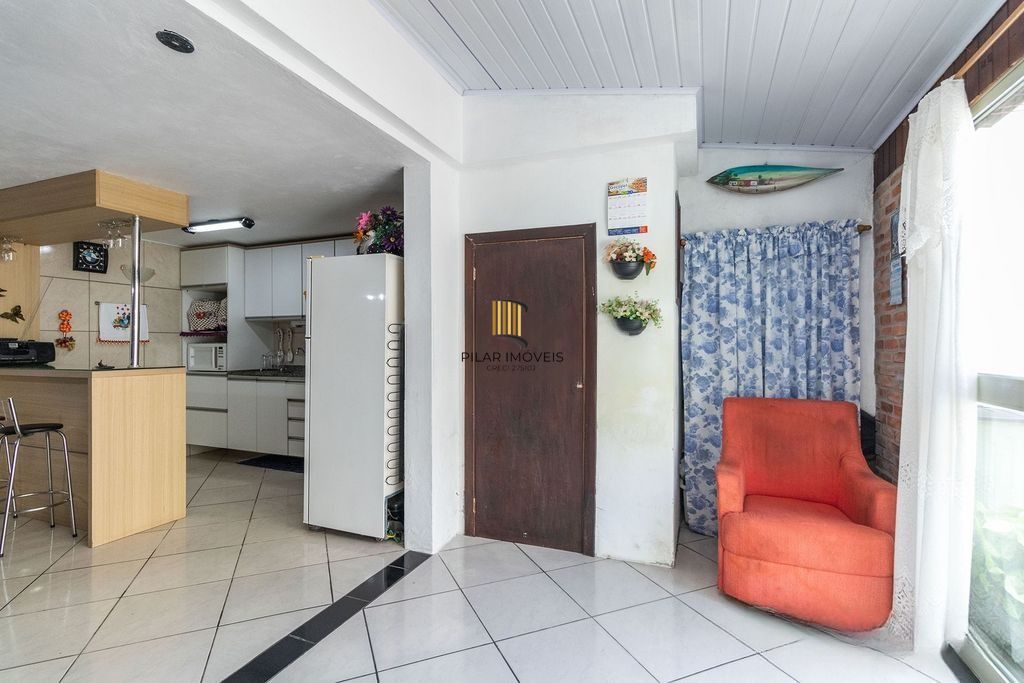 Casa com 3 dormitórios e suíte no Jardim Botânico, POA