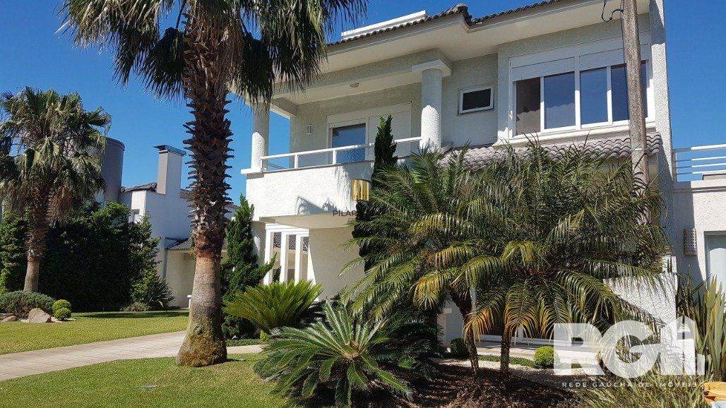 Casa de Condomínio 6 dormitórios no bairro Praia da Conceição