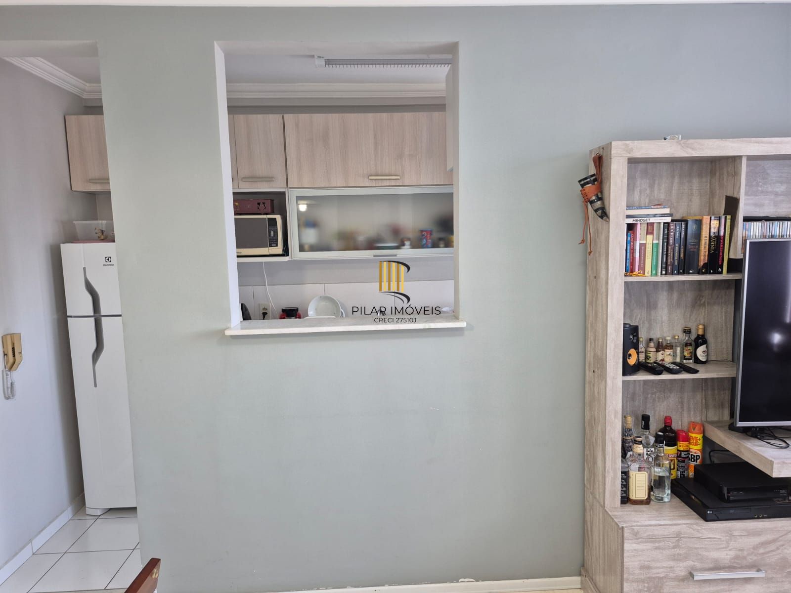 Apartamento mobiliado com 2 dormitórios e vaga de garagem