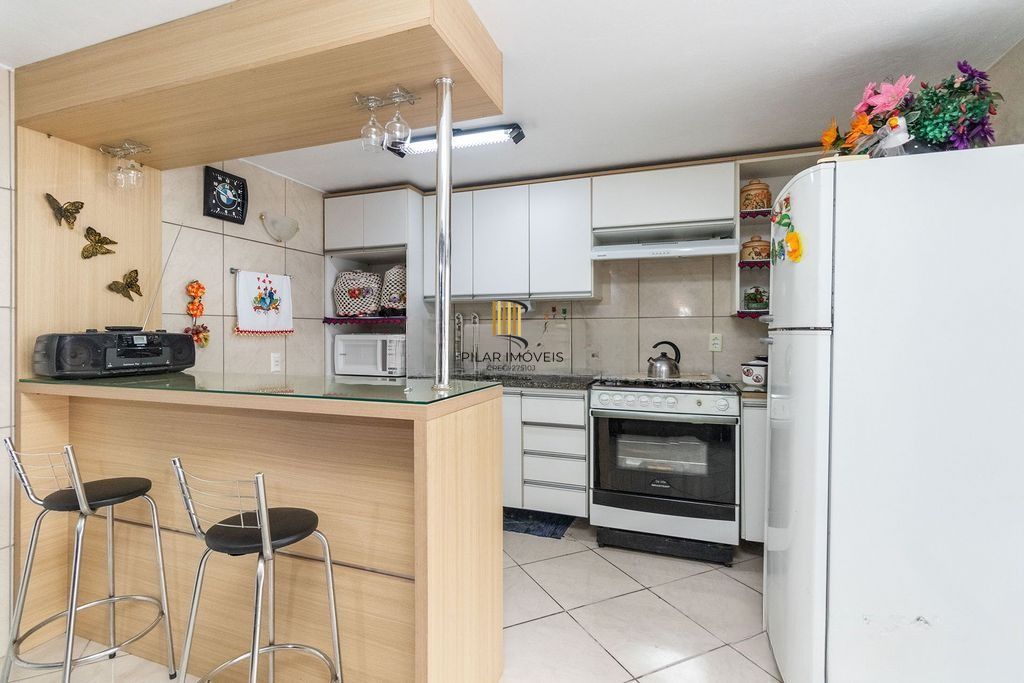 Casa com 3 dormitórios e suíte no Jardim Botânico, POA